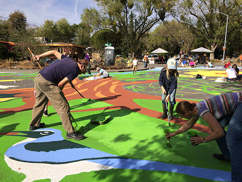 Teamwork transforms the intersection of M Street and Duke Drive into a beautiful mural.