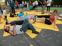 resting on giant sunflower after street mural completed